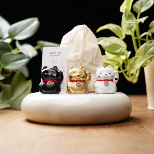 lucky cat set figurines for good luck, happiness, and protection with a feng shui coin as a collar