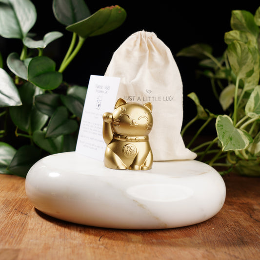 gold lucky cat figurine for good luck and prosperity