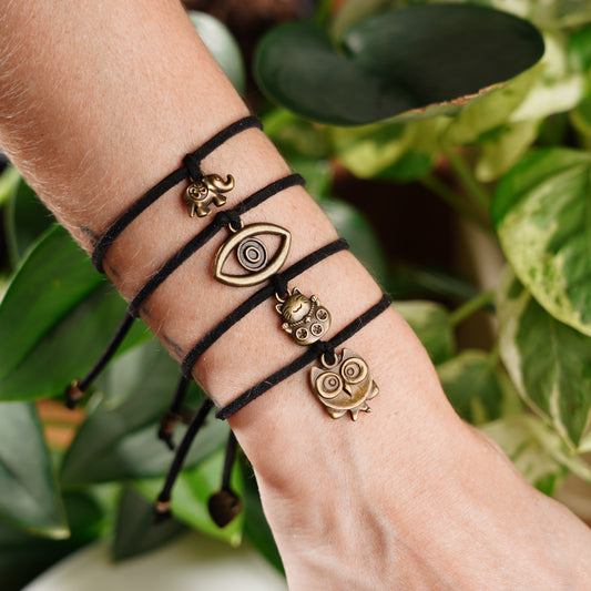 lucky charm bracelet set in black evil eye lucky cat owl and elephant