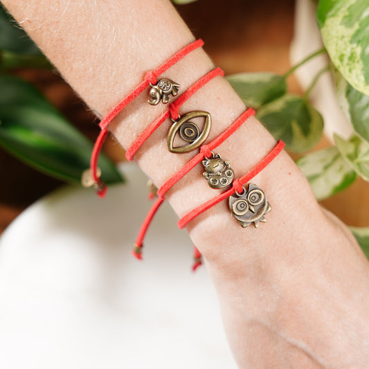 lucky charm bracelet set in red evil eye lucky cat owl and elephant